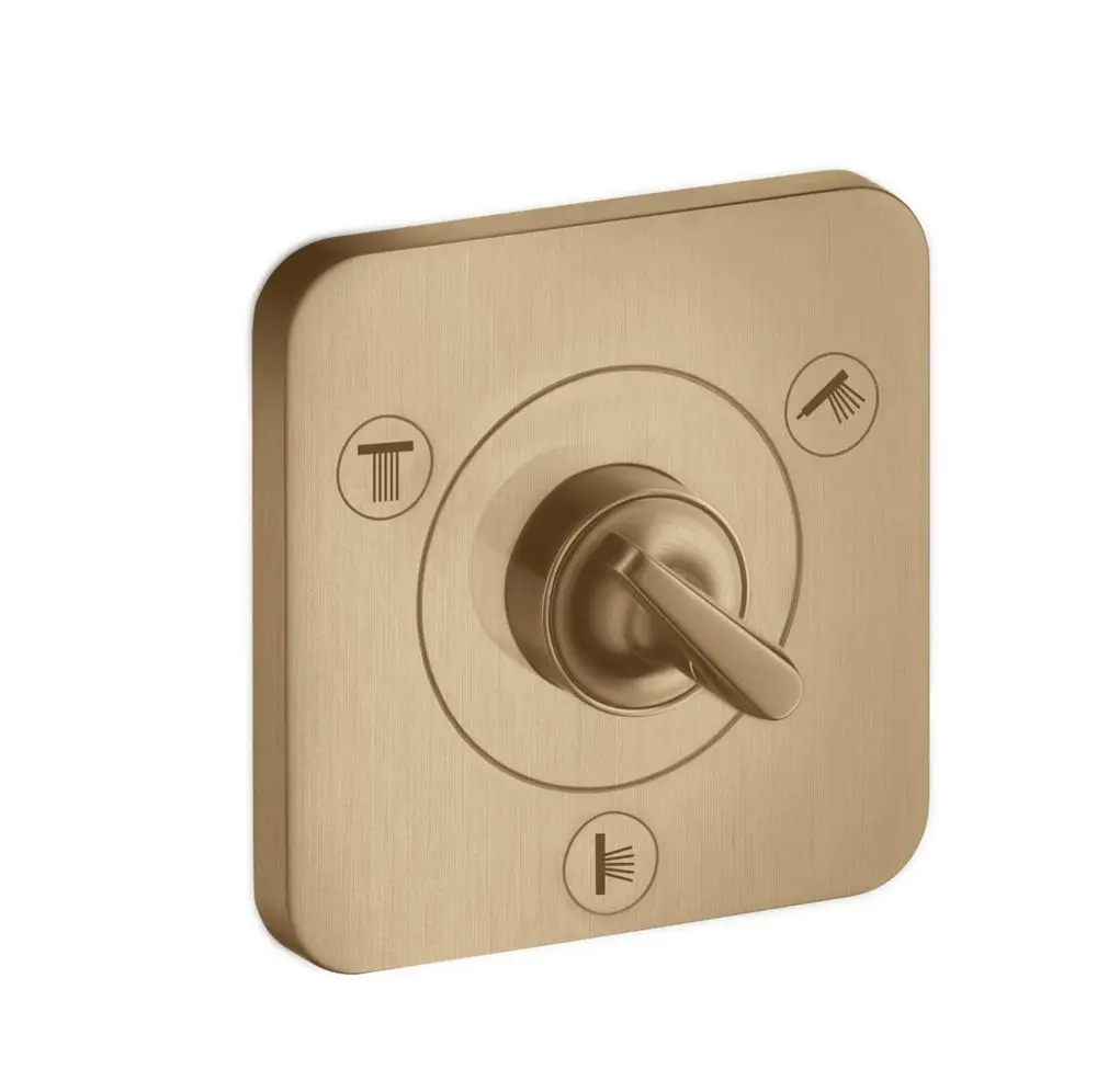 Wandmontiertes Umstellventil aus gebürstetem Bronze, ausgestattet mit einem Drehknopf zur Steuerung von Wasserströmen. Ein Produkt von AXOR.